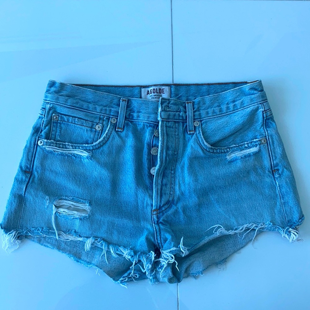 Agolde light denim wash jeans with rips